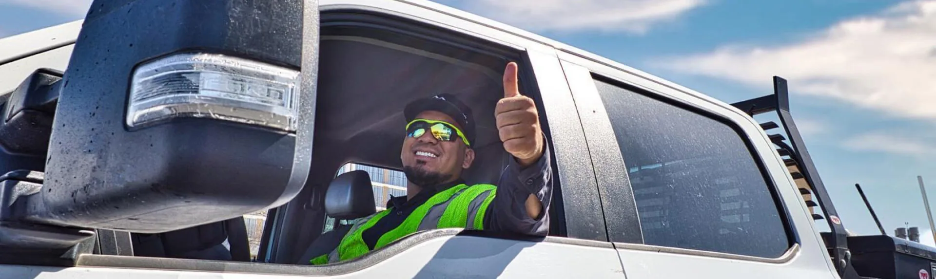 pave america employee giving a thumbs up to the camera