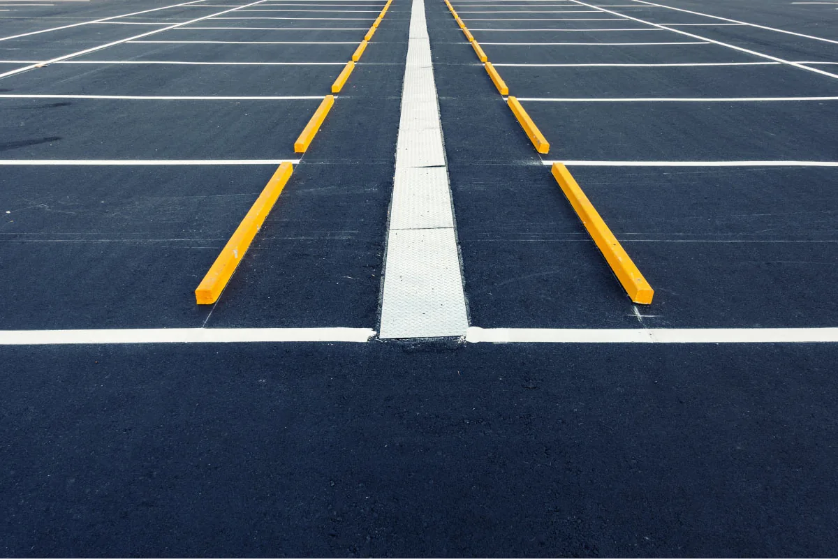 close up of parking lot curbs