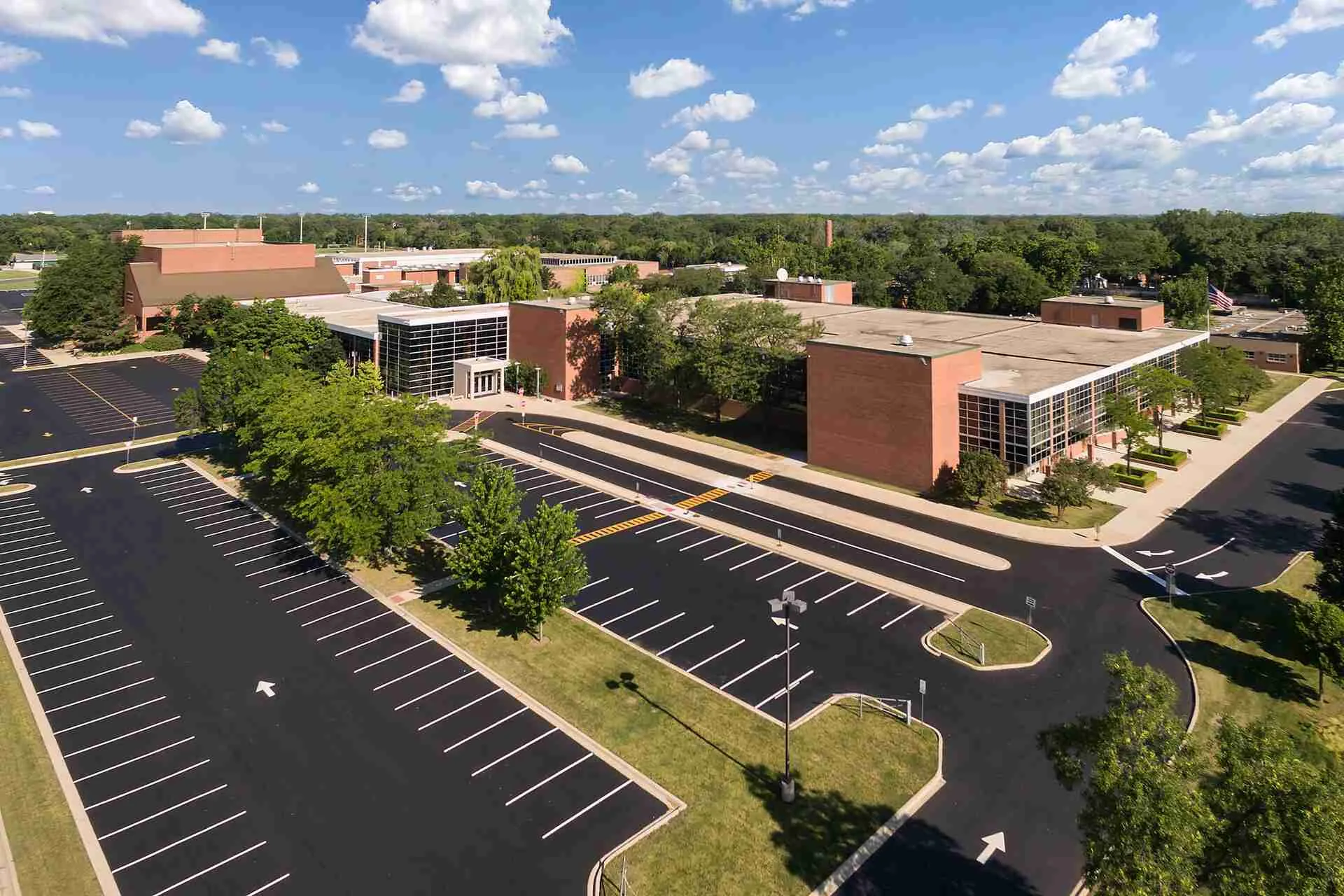 aerial view of a school and parking lot