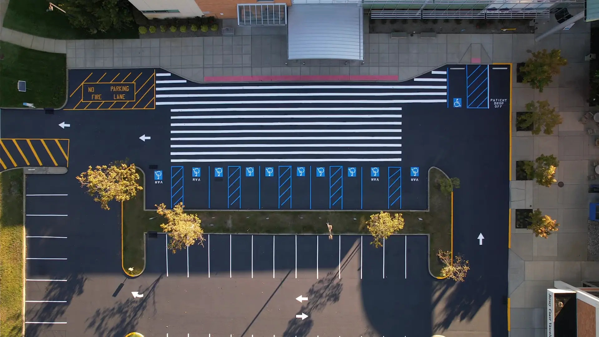 drone shot of a complete paved hospital parking lot