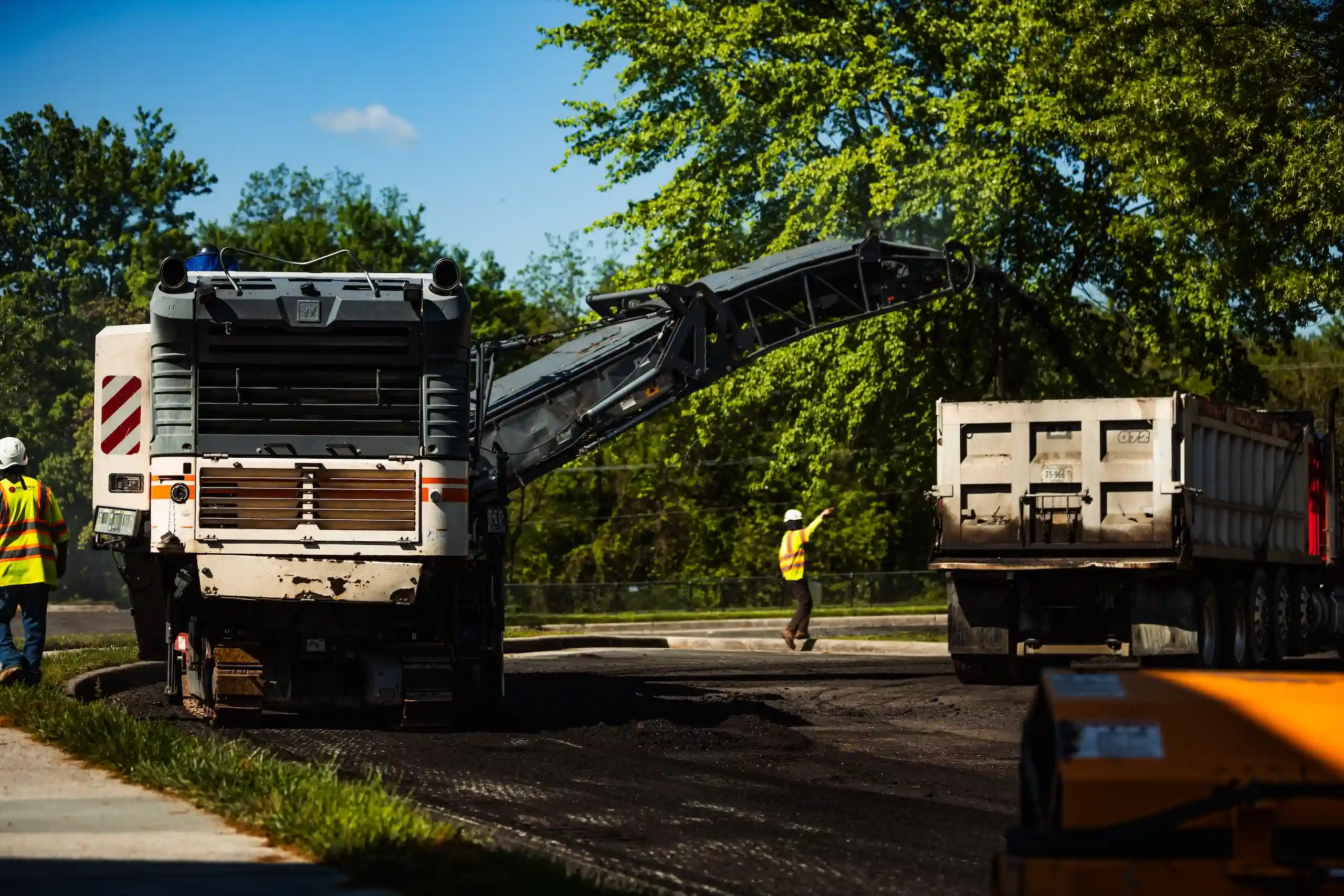 Asphalt milling cold planer on a street