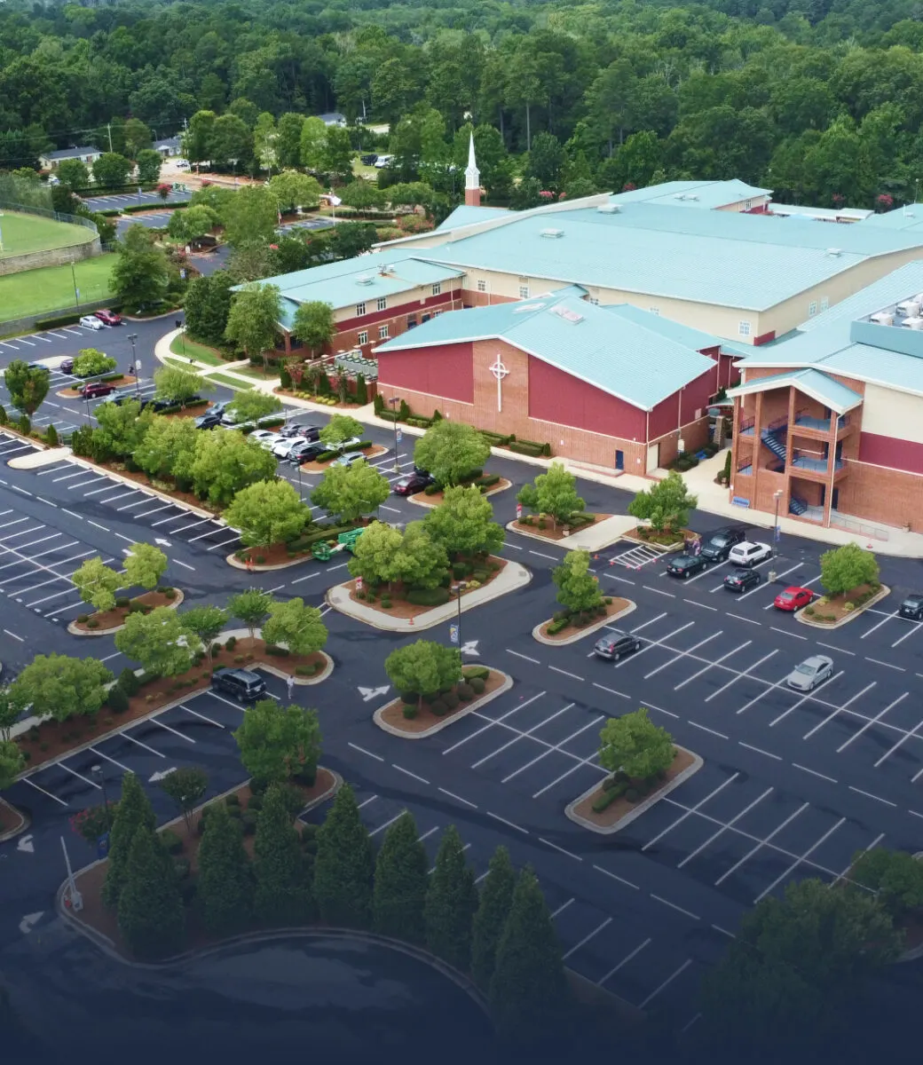 aerial view of a church and parking lot