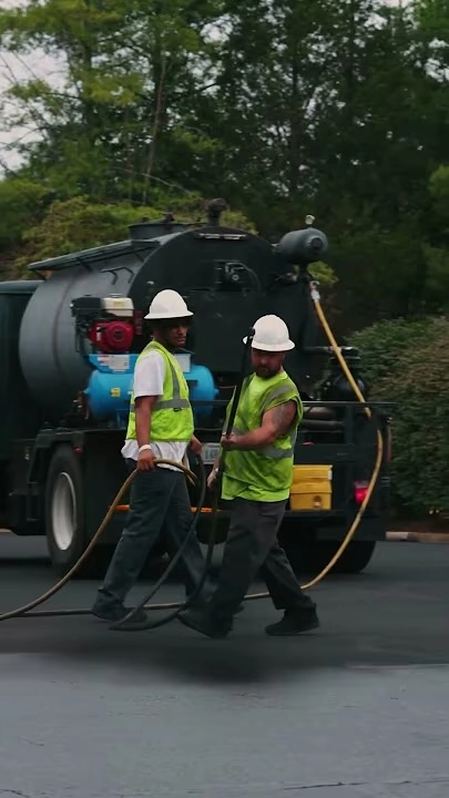 pave america employees sealcoating pavement