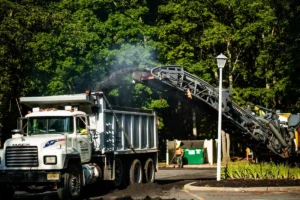 cold planer adding millings to a truck