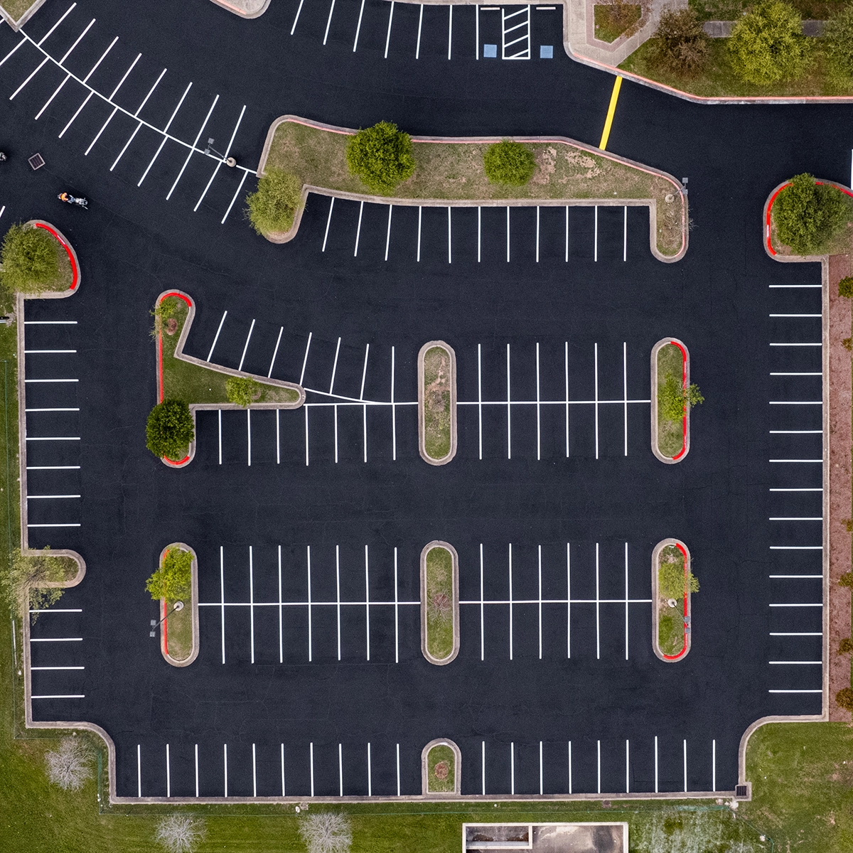 birdseye view of a freshly striped parking lot